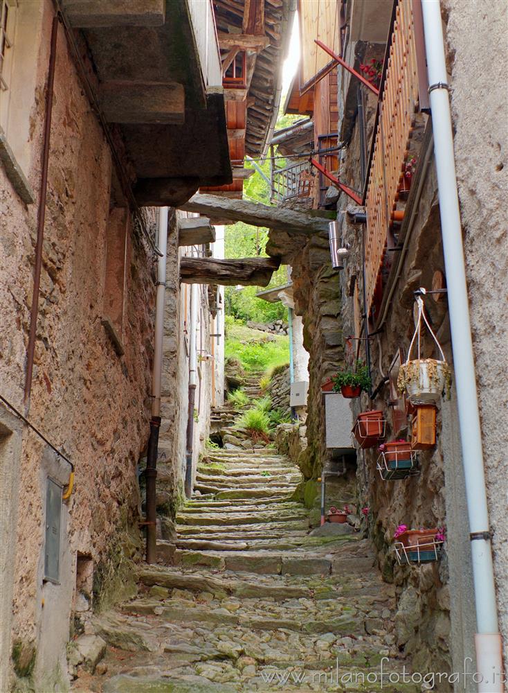 Montesinaro fraction of Piedicavallo (Biella, Italy) - Narrow street between the old houses of the village